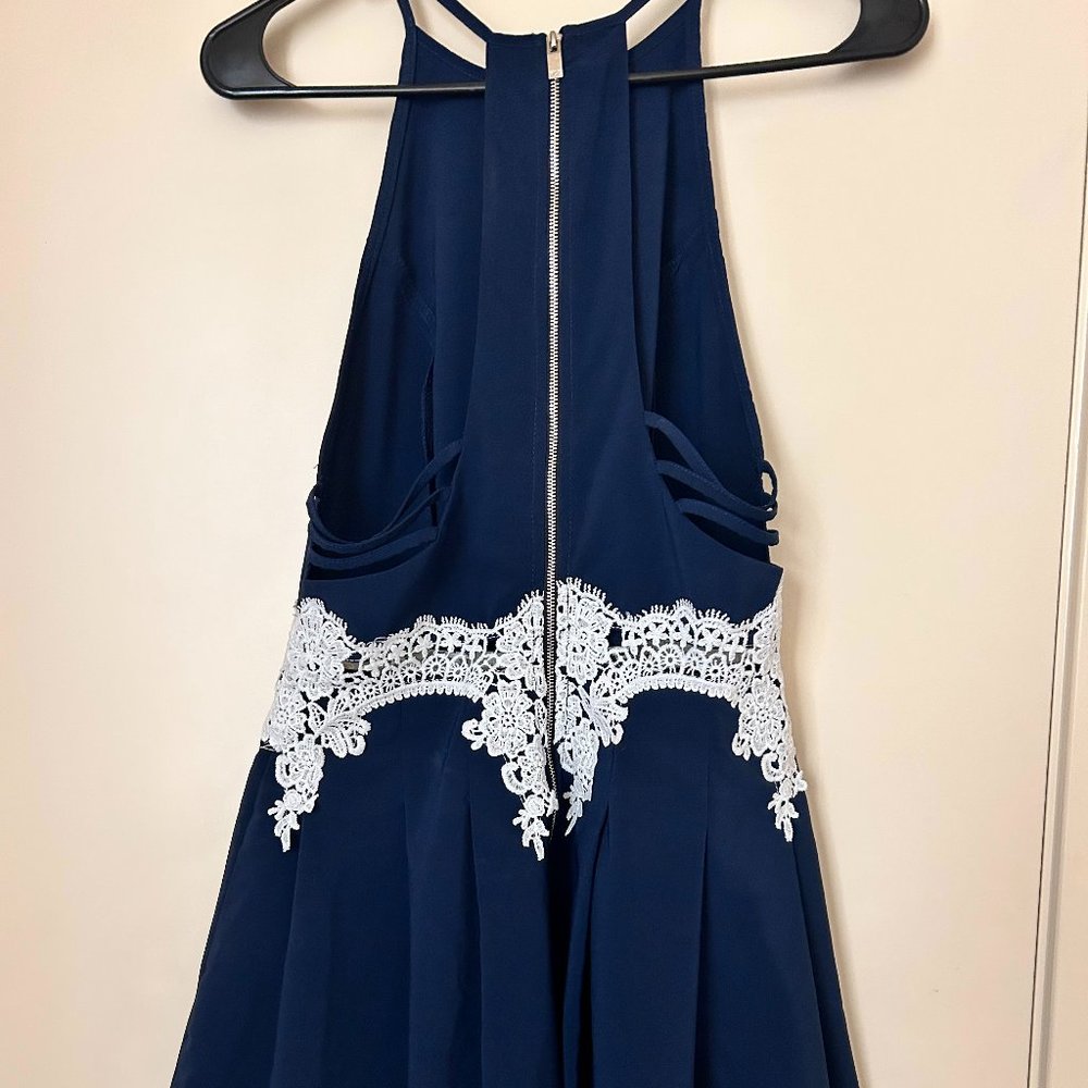 Navy Blue Halter Neck Romper with White Lacy Detail and Open Back - Picture 2 of 8